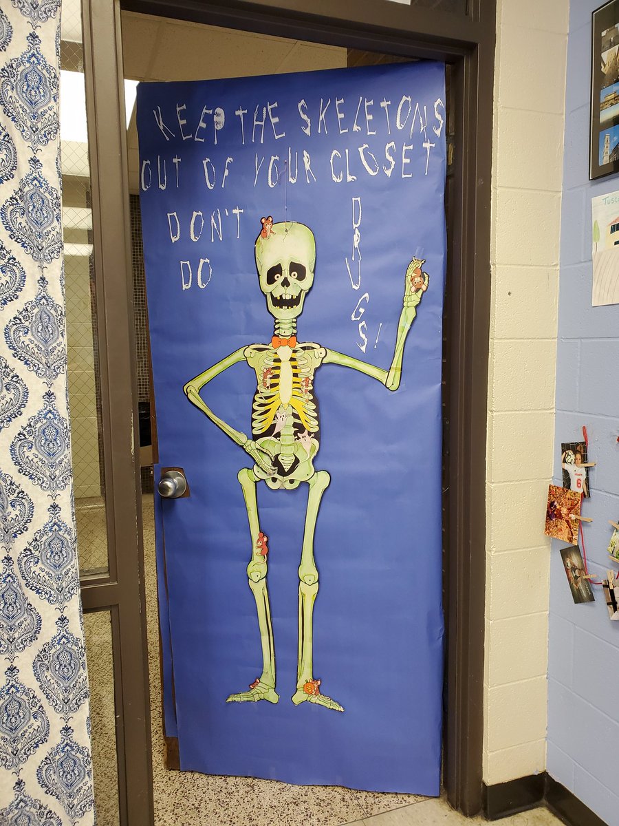 My freshman Impact did a great job decorating and agreeing to a theme for my door this Red Ribbon week. The tallest boy in my fourth period helped me finish it for them!