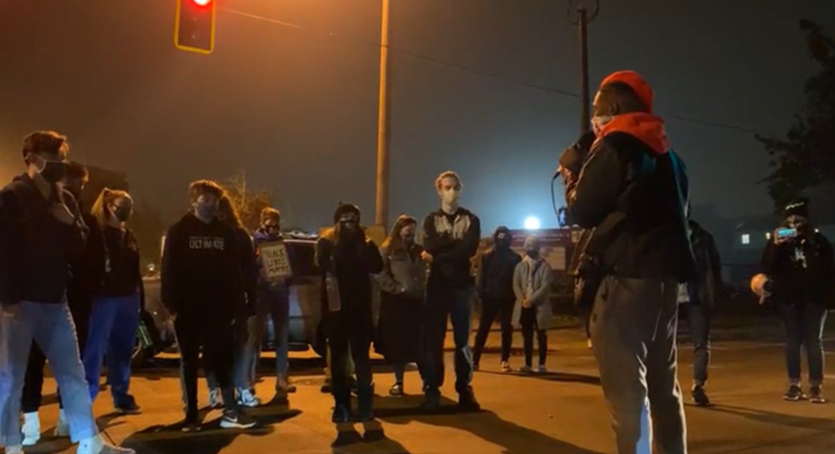 MNMissy's tweet image. Eugene college protesters blocked traffic for about 20 minutes or so.  These are non-violent citizens who conduct respectful protests daily.  #BLM #peacefulprotesters #BlackLivesMatter #BlackUnity