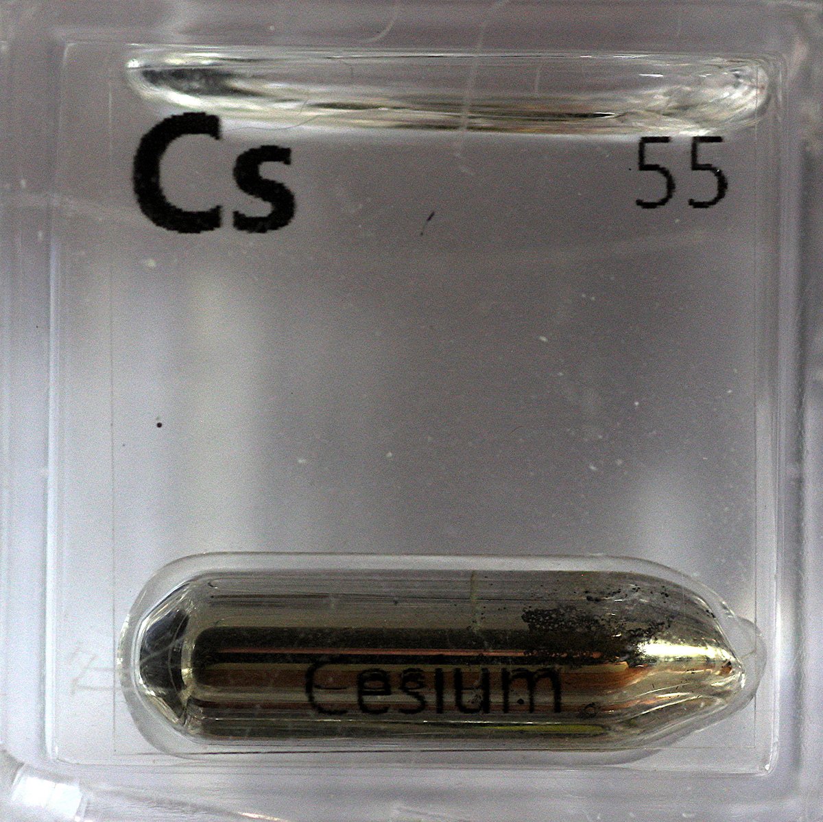 Caesium  #elementphotos. Cs is *very* reactive but has a lovely golden colour and a melting point of only 28.5 °C, meaning that on a hot summer day it joins mercury and bromine as a liquid element. White powder is caesium iodide (CsI).