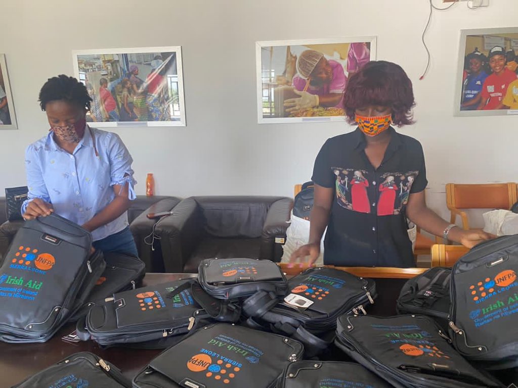 UNFPASierraleon's tweet photo. As part of our continued #COVID19 response, and with funding from @irlembfreetown, @UNFPA #SierraLeone staff are working round the clock to prepare school kits to be distributed by our partners to 1000 school going adolescent girls  in Pujehun, Port Loko and Kambia districts. https://t.co/y19uTVlqDG