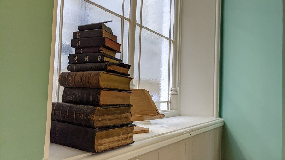 Back down on the ground floor was a small room, containing a big stack of books.There was only one thing to be done - and that was to check for treasures - luckily, because this was a special church visit, I'd invited  @oldenoughtosay, an actual museum professional, along.