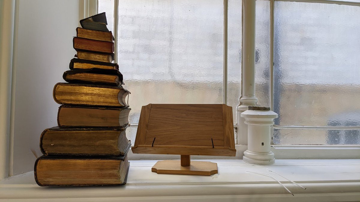 Back down on the ground floor was a small room, containing a big stack of books.There was only one thing to be done - and that was to check for treasures - luckily, because this was a special church visit, I'd invited  @oldenoughtosay, an actual museum professional, along.