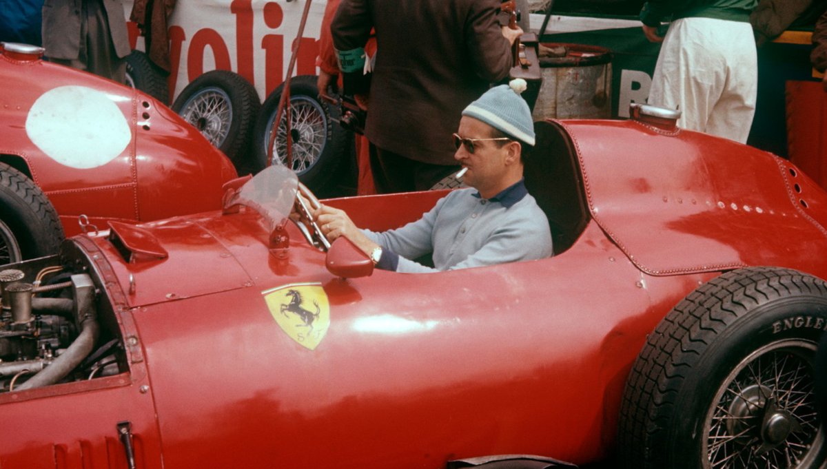 Remembering Maurice Trintignant, born #OnThisDay 1917, winner of 2 #F1 GPs, both at Monaco ('55, '58), & at #LeMans in '54 (with Froilán González), & a noted Languedoc-Roussillon winemaker in later life. Pic: Lancia-Ferrari D50, Aintree '57, bobble hat & ciggie present & correct. https://t.co/yNXfY9AGvA