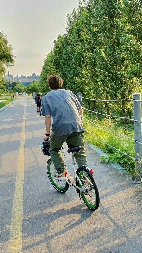 Joon loves riding bicycle in the clear sky.....