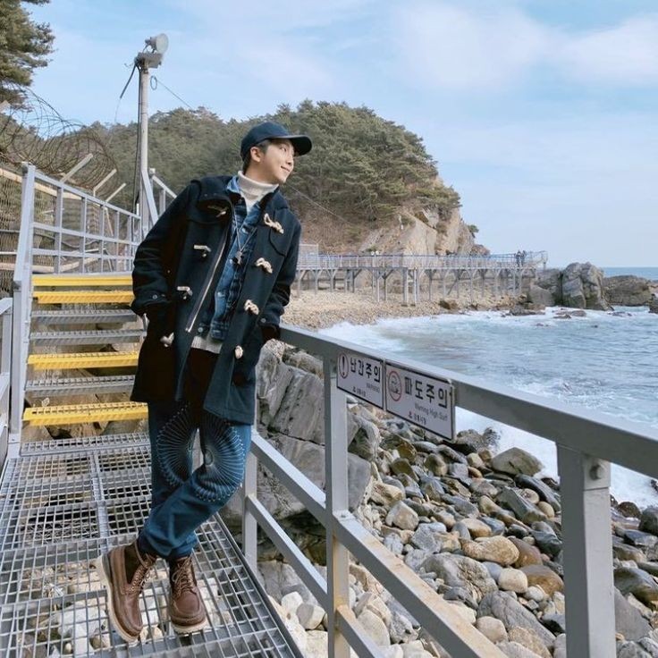 Namjoon with the river behind.....