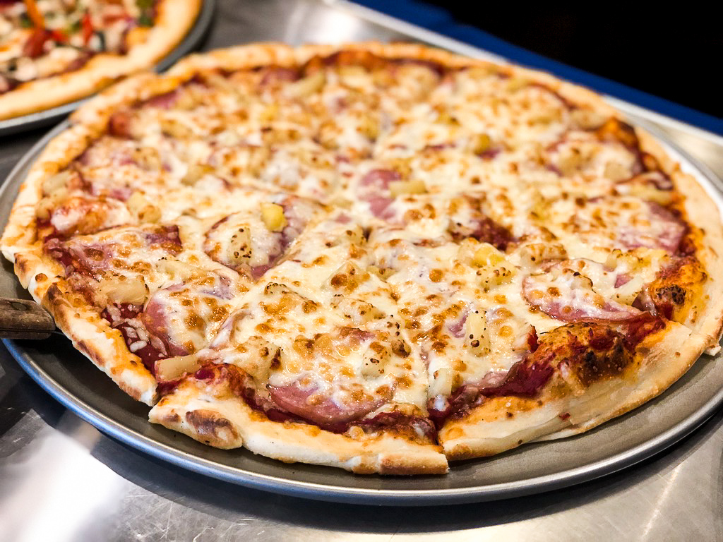 thirstylionwpg's tweet photo. Does pineapple belong on a pizza?🍍 Are you a Hawaiian Pizza lover or completely against it?🍕 Tell us in the comments! https://t.co/IiUrCfhL3q