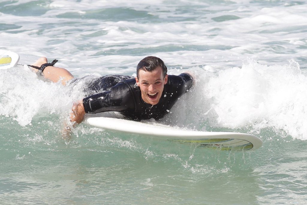 louis tomlinson with wet hair; a thread