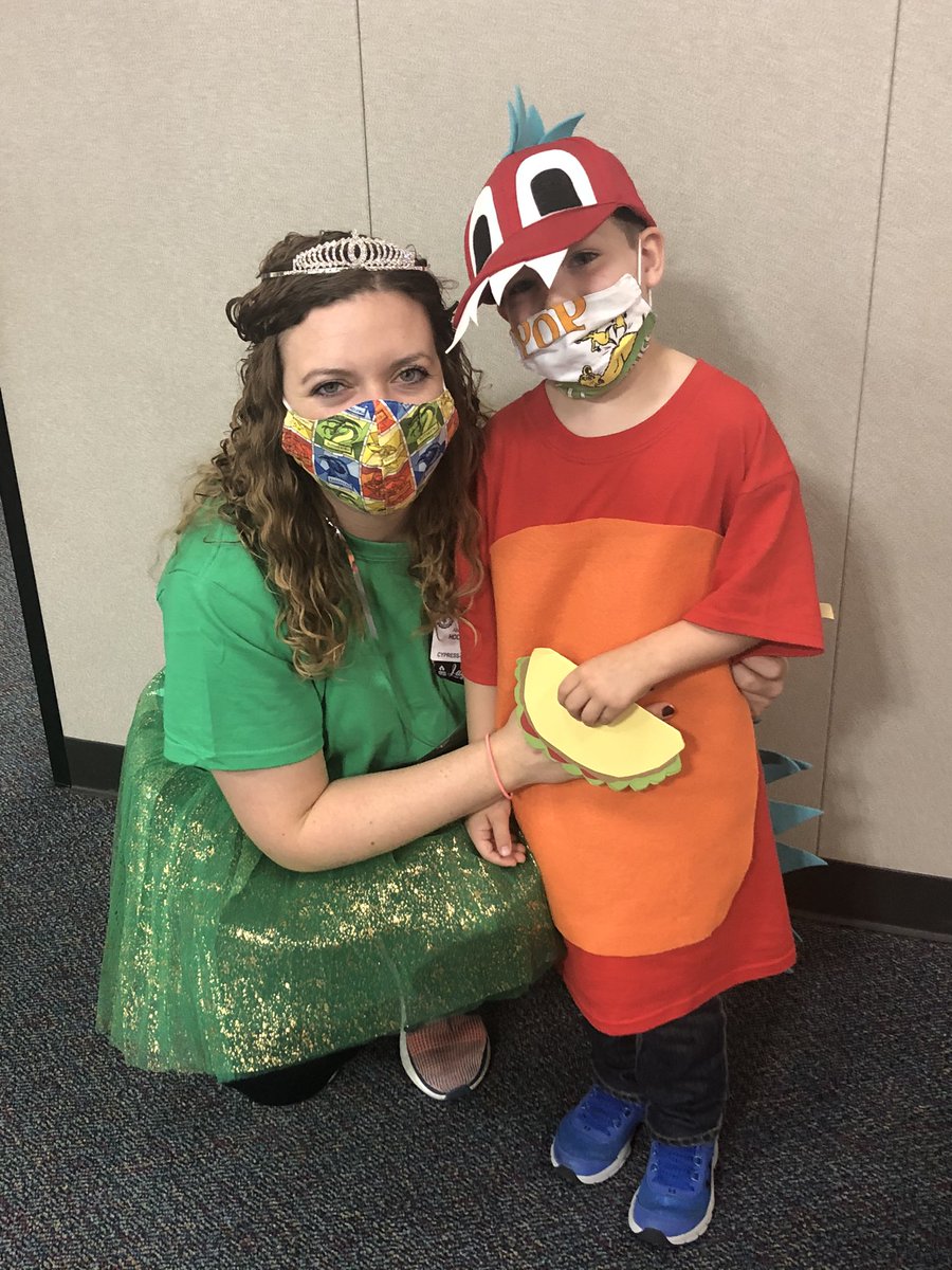 LibraryLowery's tweet photo. Hooked on Books, Not Drugs: Book Character Day! We are Emeraldlicious and a Dragon That Loves Tacos! #LoweryPROUD #CFISDspirit #RedRibbonWeek2020 https://t.co/DxfLLXWNzP