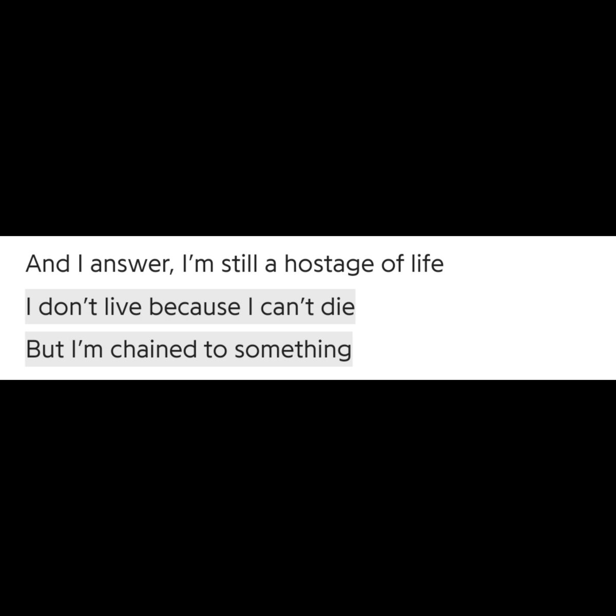 On, smth he is entangled w, smth which is the cause of his existence. Life has taken him hostage, to keep him in security so that he can't escape until the purpose is fulfilled. The fact that this applies to most of us only shows the accuracy of the statement, it's like we cant+