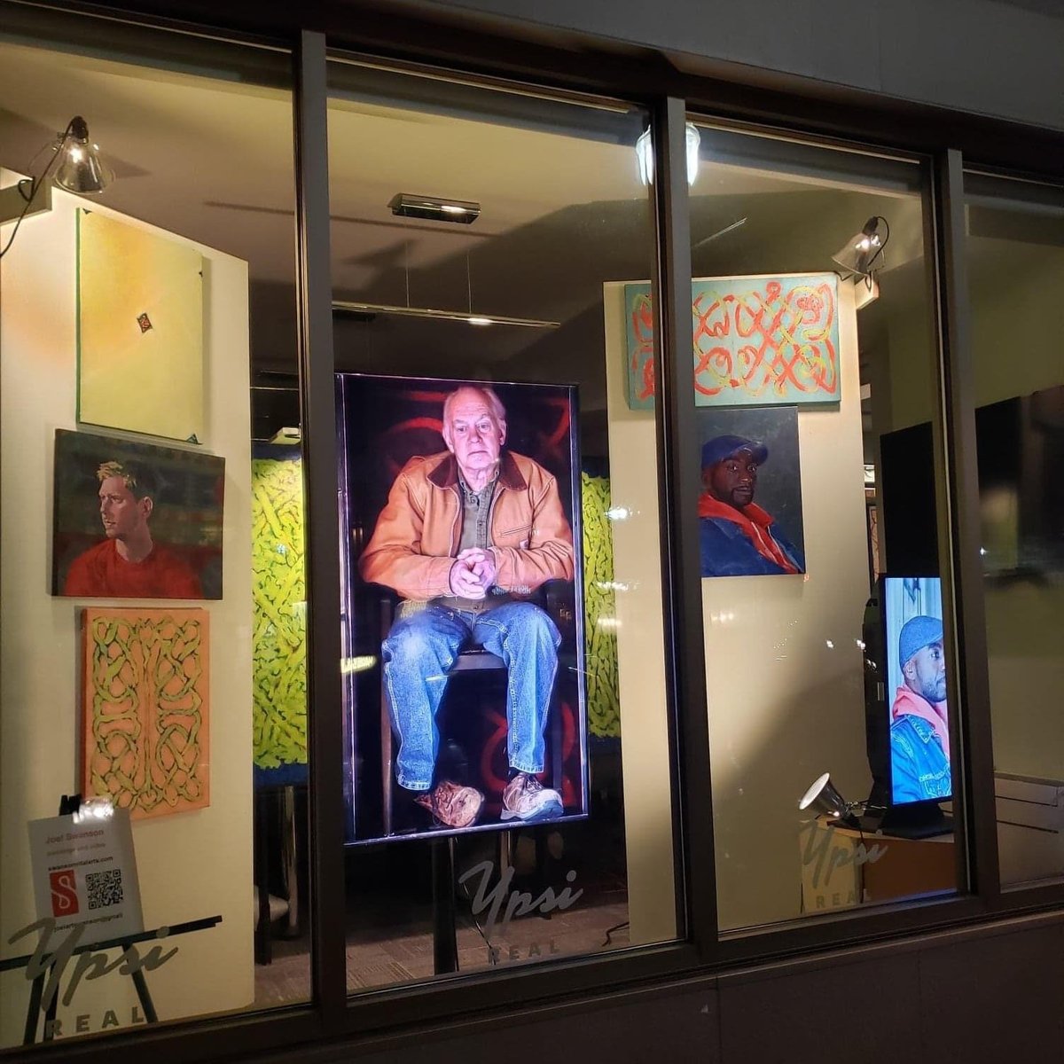 #ypsiGLOW artists amazed us!  Don't miss #joelswanson's installation in the #ypsireal windows at 106 W. Michigan--Living Ypsilanti. His Ypsilanti Portrait Project records the faces of Ypsi residents, each one essential to the life of the city.  Thanks to sponsor #bankofannarbor!