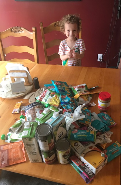 FoodEquality's tweet photo. Open for a SURPRISE! Luke is excited about his first food box ft. @Sunbutter, @gochomps, @Enjoylifefoods, @lovekips1, @perfectgranola, @prevailjerky @88acresfoods - not including the GF bread &amp; fresh produce we often provide! 🙌🏾⁠ #GlutenFree #FoodAllergy https://t.co/8mdnr4kyAU