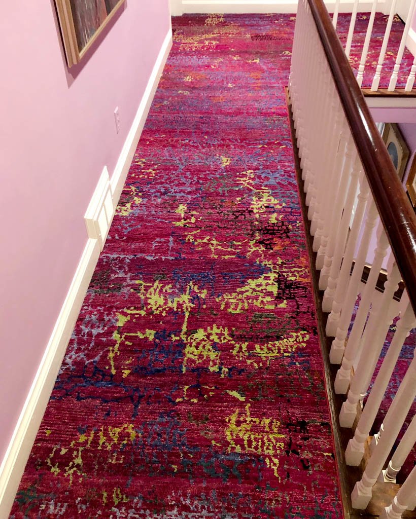 A new custom install for the stairs and hallway based on our Coral Keys design.