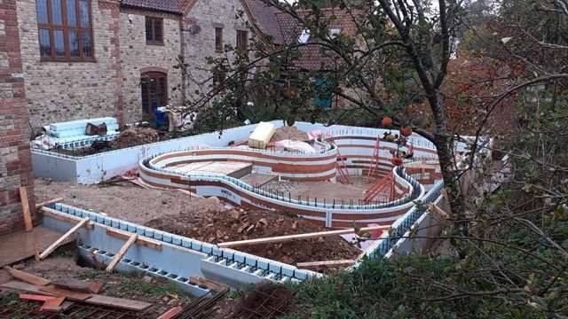 icfsupplies's tweet photo. @NUDURAICF curved pool and poolhouse under #construction in #Leicestershire Note the corbel blocks to carry the external stone finish supplied and supervised by @icfsupplies #ICF #designfriendly https://t.co/ixwYF4ks4Q