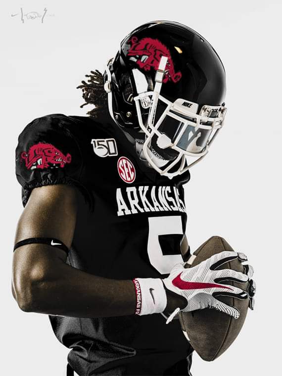 anthracite football helmet I'm not much for anthracite. If they're gonna have a special game uniform  with black make it true black. Also a helmet with a slobber Hog logo? Oh  man. This would be