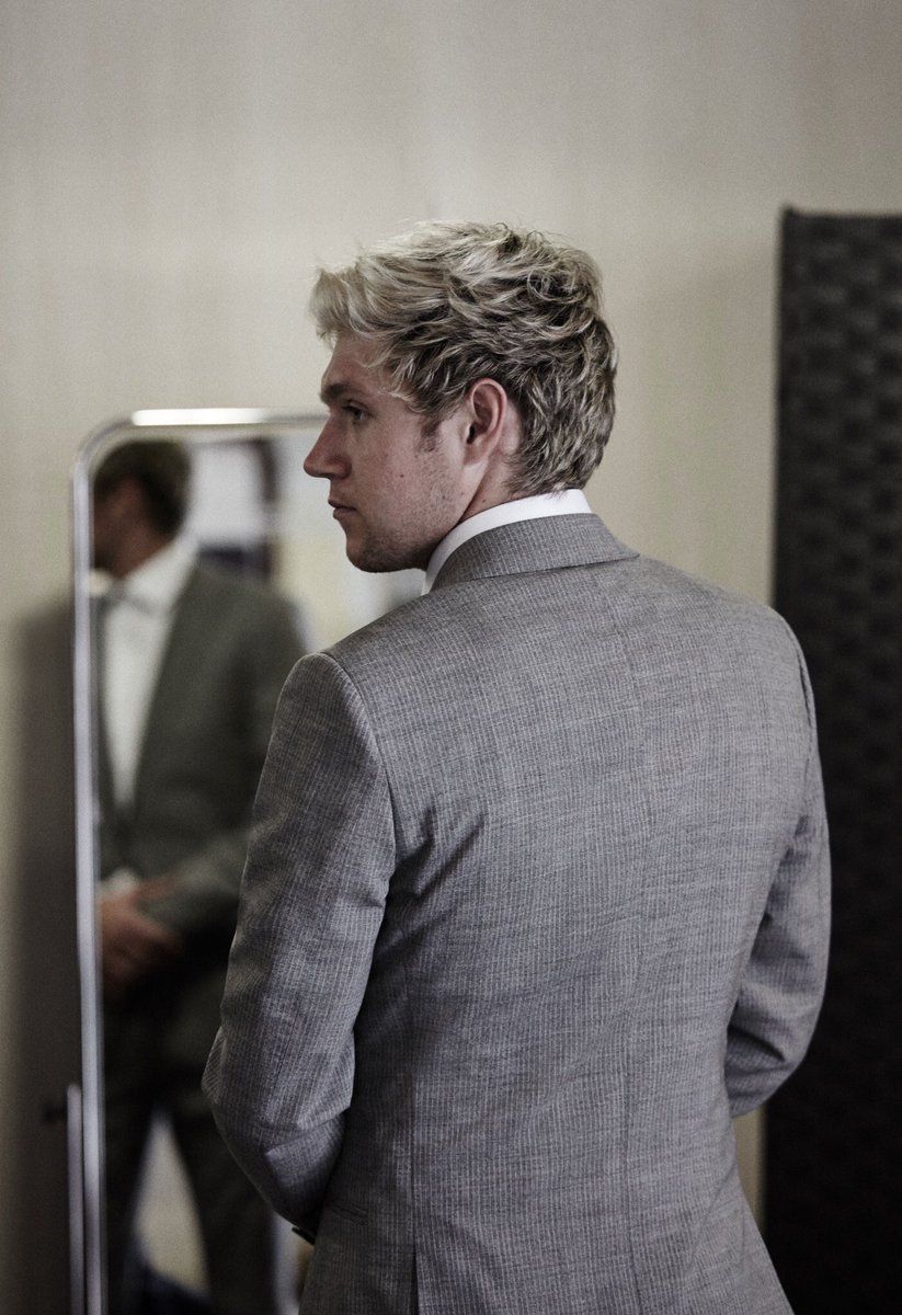 One of my favourite picture that showcases his wonderful back profile, that too in a suit!
