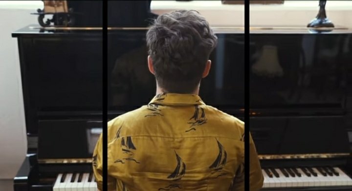 The perfect back view of his posture when he's sitting down and playing the piano 