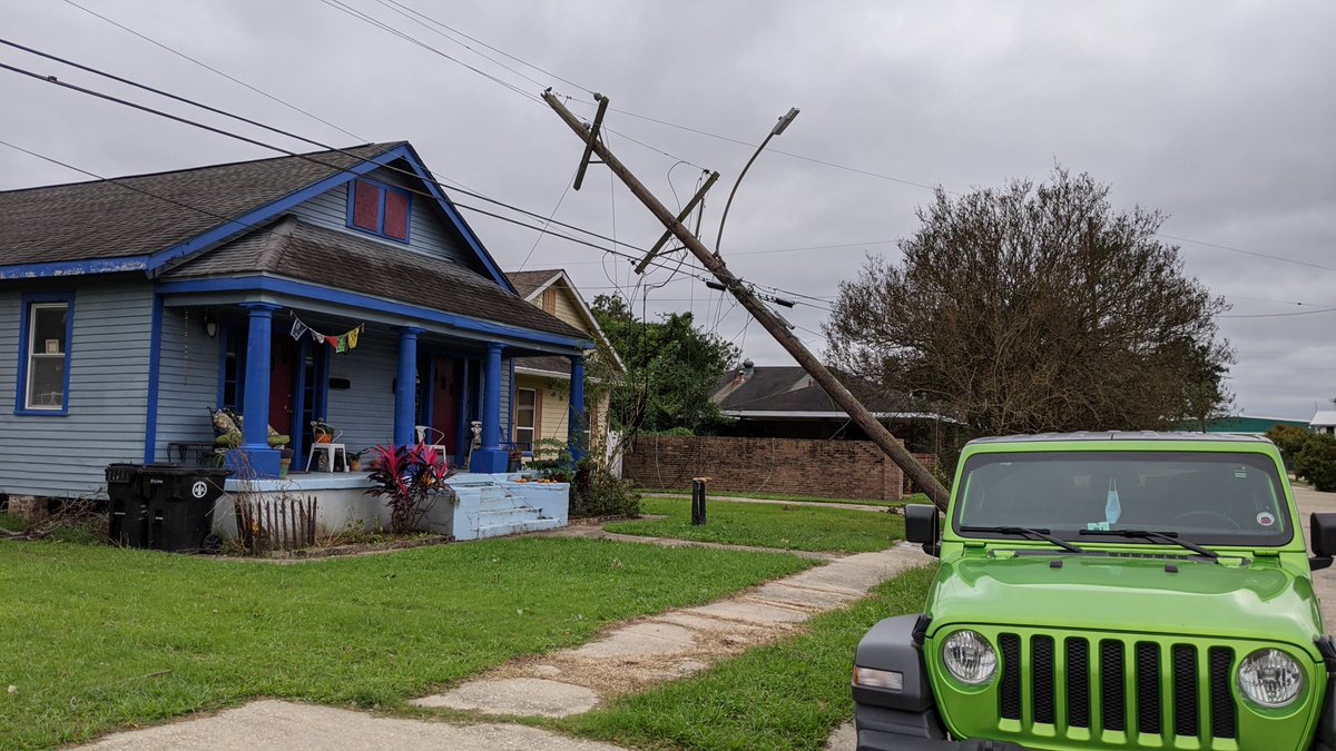 thatgibbyguy's tweet photo. Hey @EntergyNOLA , your lines are down and resting on these peoples' homes, and you haven't even sent and assessment crew. This is at Trafalgar &amp; N. Rendon across from an elementary school. Kids play here, when are you going to do something? https://t.co/ncP48Z25KZ