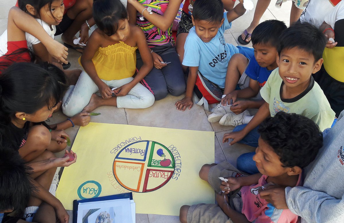 FIMRC's tweet photo. #FIMRC doesn’t just provide healthcare to our communities around the world, but health education too. At Project Aconcito, Ecuador, we are conducting a nutrition education campaign to educate the community on proper nutrition &amp; a healthy lifestyle. Photo taken before COVID-19 🙂 https://t.co/9HkxoNPCSl