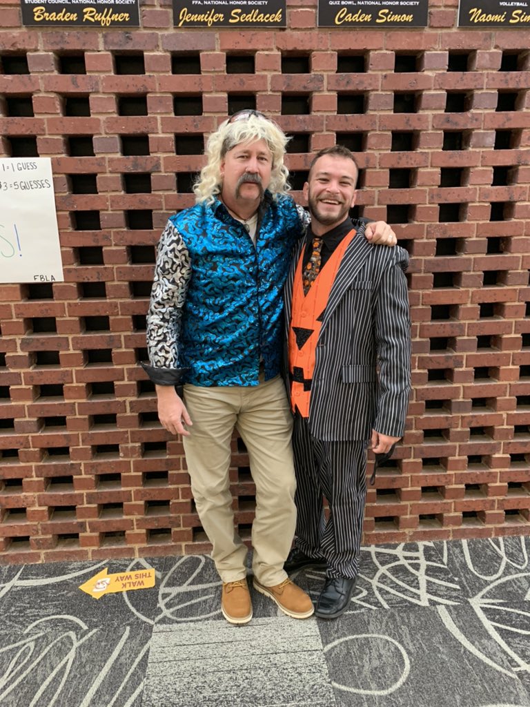kyjo41's tweet photo. That will be Carole to you...
Joe, Carole, and our #1 fan are roaming the halls at @c1stoga! 🐯 
#halloween #JoeExotic #carolebaskin #TigerKing https://t.co/wBDtZ8OWQP