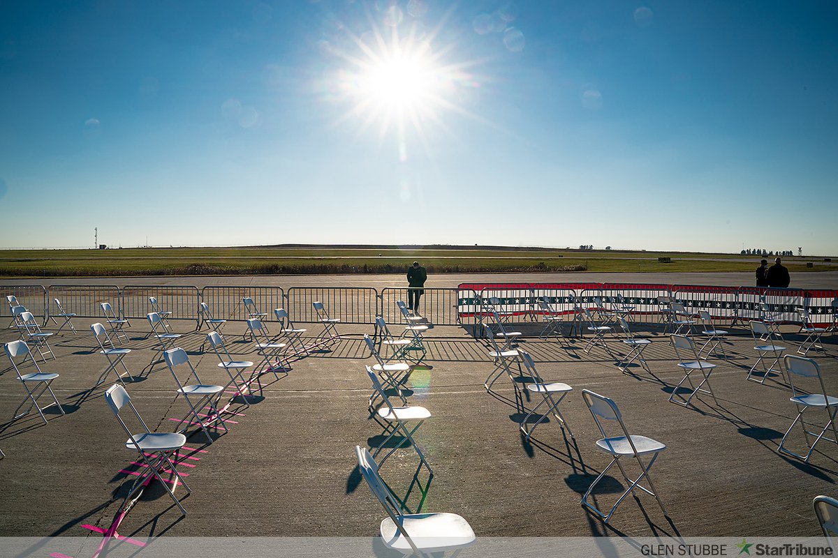 Chairs spread six feet apart on the tarmac at Rochester, Minnesota Airport awaiting President Trump’s arrival