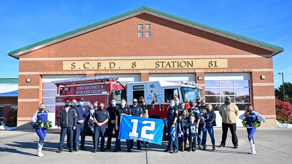 TaimatheHawk's tweet photo. Made a quick flight to Spokane to celebrate this week's 12 Flag raisers. Thank you, first responders! 🧑🚒🚒 #GoHawks https://t.co/WQaElILlCS
