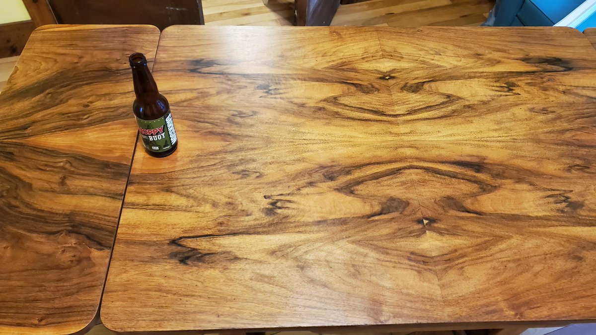 jason_loxton's tweet photo. Continuing #HeavyGarbage refinshings, here's one I picked up a few years ago but just finished this summer. No idea what to do with it, but couldn't leave it. Was caked w/ varnish when I got it. Wood grain SO beautiful. Folds out. Craft beer for scale. :) https://t.co/5oSePwE8DS