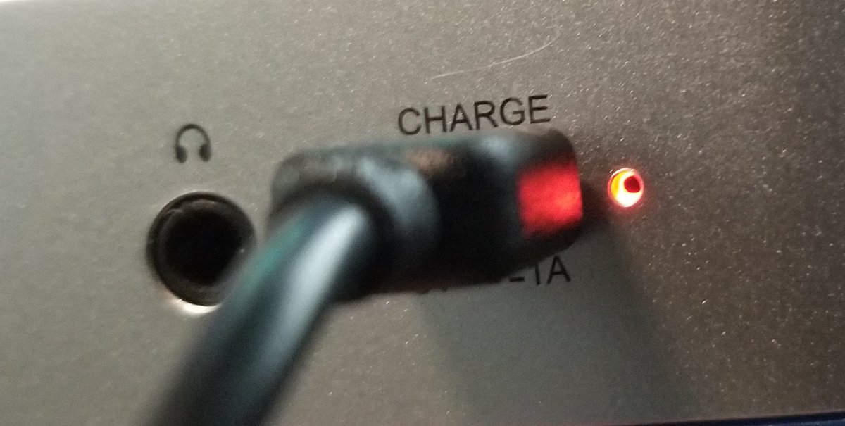 It's got a little blinky light when charging.And apparently the data pins aren't connected: it doesn't show up as a flash drive or anything when plugged into a PC. Shame.