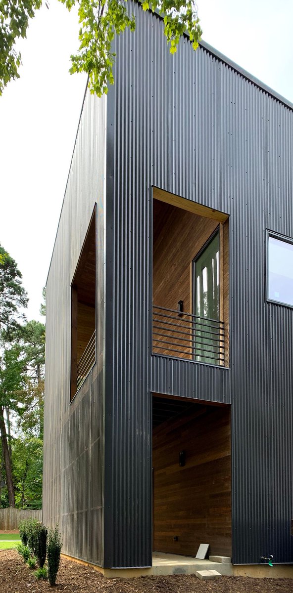thoughtcraftarc's tweet photo. Franklin Residence: Update – The exterior is complete! The home features an open floor plan,  street facing semi-private porches, a large window wall facing the forest, and concrete floors. Wood cabinetry and accent walls create a warm modern interior. https://t.co/3bciGuJ6jr
