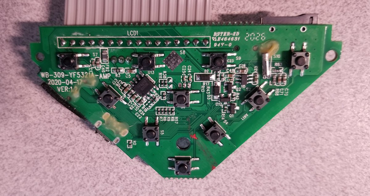 The main PCB, other side.It calls itself a WB-309-YF5321A-AMP, Version 1.2, date of 2020-04-17.Bunch of little tactile switches for the buttons.