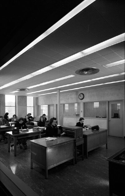 Kroeger also seemed particularly conscious of interior compositions involving vectors of ceiling lights. Office interior, Dakota Iron StoreSioux Falls, S. Dak.Fri., Jun. 20, 1947