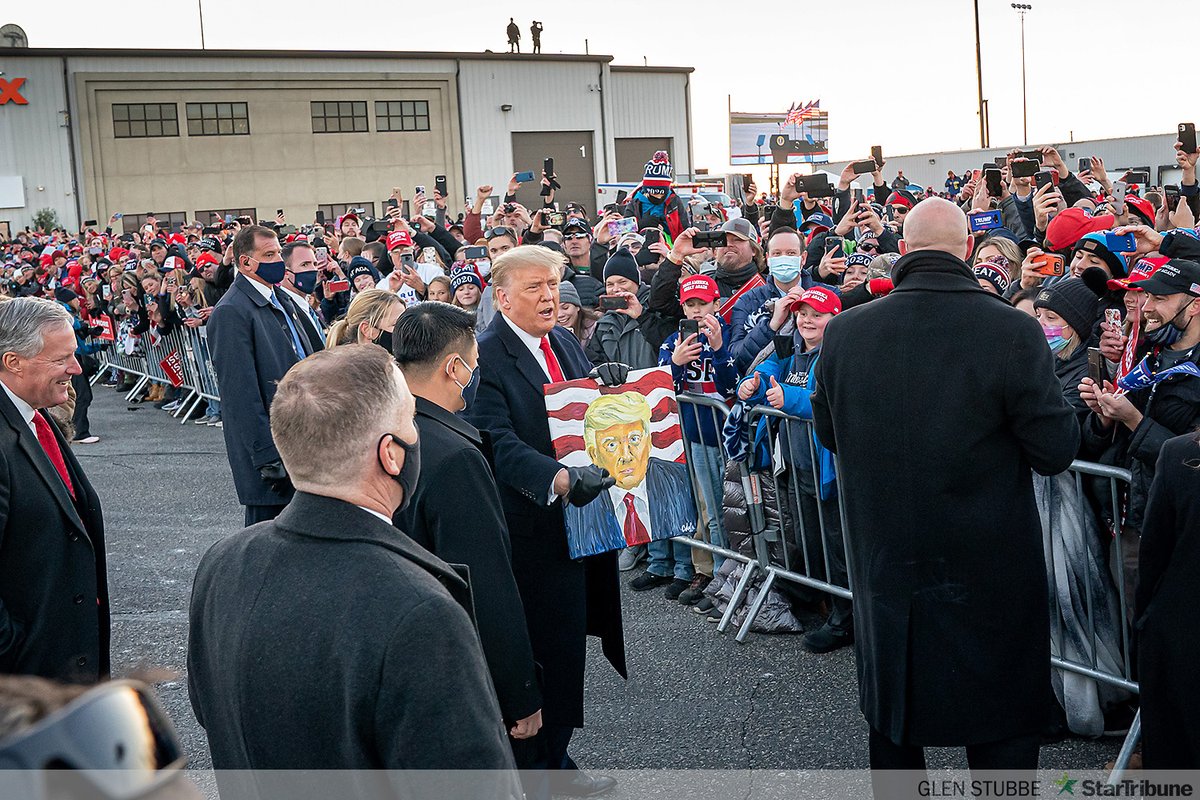 Immediately after he landed, President Donald Trump visited with hundreds of supporters who gathered outside Rochester, MN airport. Inside the rally was limited to 250 people but hundreds more waited outside.