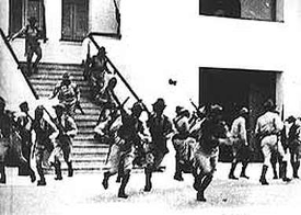 (7/12) On July 26th, 1953, Castro and his 138 rebels drove to Moncada. One car made it inside, but the guards sounded the alarm and the rebels fell under attack before most of them could get into the compound. Seeing that the assault was hopeless, Castro called for a retreat.