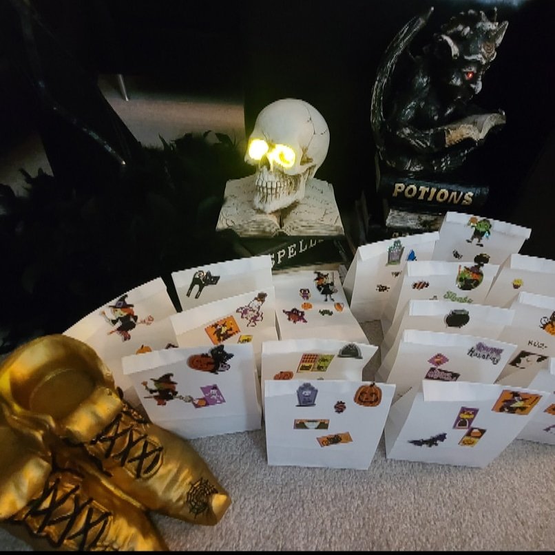 These boots r ready for walking!   Hat &amp; spell book ready. Treat bags (prepared extremely safely) done for the kiddos!  Safely passed with BBQ tongs. 
Take a break and check out all your hard working neighbour's who did such a great job on decor. 👻👻🎃🎃