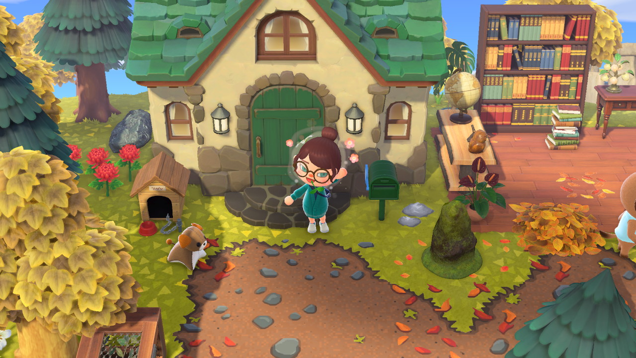 On voit un avatar Animal Crossing devant une maison.