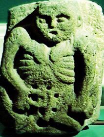 Folklorists have suggested that carved turnips were used to scare away malevolent spirits on a night when they roamed the countryside. A similar rationale is given for Sheela Na Gigs - which guard the exterior of ancient churches established by Irish religious figures