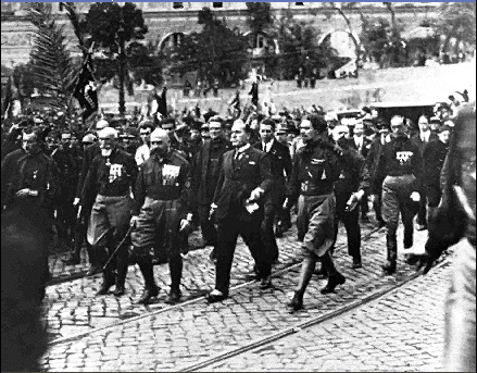 The intimidation of opponents is known as "squadrismo". Mussolini is careful to keep himself out of any direct involvement; he doesn't even participate personally in the march on Rome, turning up only at the end, when its success is assured (photo) >> 4