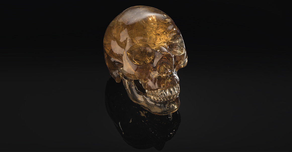GIAnews's tweet photo. Happy Halloween! 💀 Meet Greggory, a life-sized carving of a human skull, with a cranium and a separate mandible, crafted out of 25,190 carats of smoky quartz from Brazil! Photo: Robert Weldon/GIA Collection https://t.co/TxTxnVxcPr