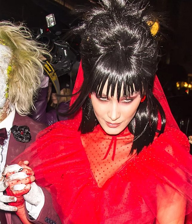 ISABELLAHADlD's tweet photo. @LASEULEMAISON Emulating the popular movie, I'm inspired by the wedding dress during one of the filmβs most important scenes, it featured layers of red tulle, a flowing veil, and matching gloves for the full undead bride effect. #LastHomecoming https://t.co/7uuXj3gGLj