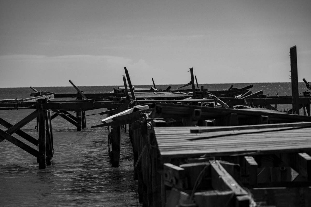 aaronjayjack's tweet image. This pier in Bay St Louis didn't stand a chance in the storm surge from Hurricane Zeta. Just a couple hours before the storm I was on this pier checking out the couple of fishermen fishing off the end. #zeta #HurricaneZeta @MyRadarWX