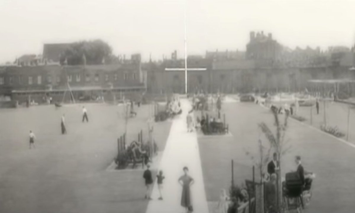 A shot here from the raised area (the bridge of the ship) in the 1950s looks to the nautical themed flagpole (the mast) and also what would have been the now vanished Edith Street.