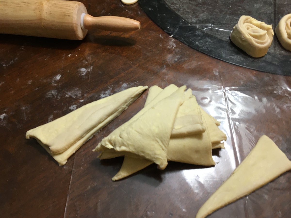 Shaping triangles out of croissant dough