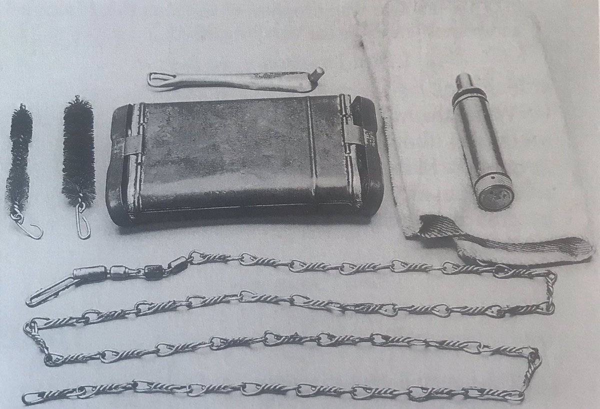 He’s laid a blanket on the parapet to prevent dirt contamination, with his RG34 cleaning kit & 2 of his 3 issued barrels on the right. To the left are top cover, bolt, muzzle flash suppressor, spring & stock & presumably cocking handle & slide. 37b)