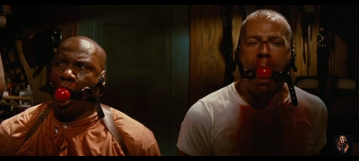 The shop owner traps both of them in the basement and calls his police officer friend. His friend choses wallace and butch somehow manages to escape but wallace is getting raped by the police officer.