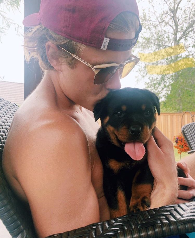 he probably thought the dog was the star of the picture. nope it was his arm