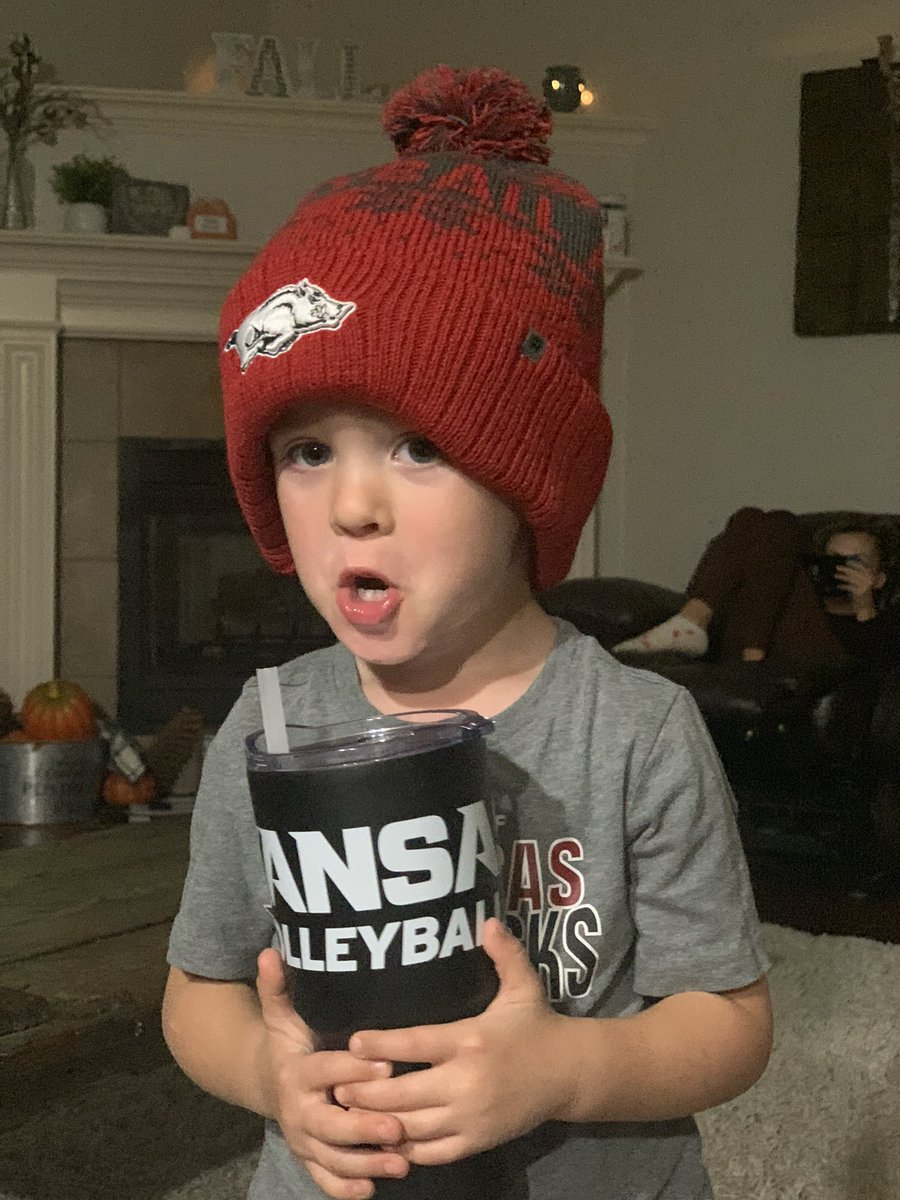 AnnMomographer's tweet photo. Hudson won the @RazorbackVB Costume Contest today and is loving his goodies! I tried to claim the cup, but he keeps taking off with it! https://t.co/7RjtMFlpu6
