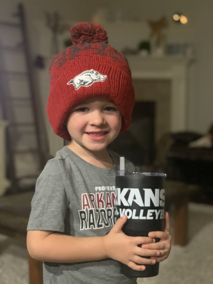 AnnMomographer's tweet photo. Hudson won the @RazorbackVB Costume Contest today and is loving his goodies! I tried to claim the cup, but he keeps taking off with it! https://t.co/7RjtMFlpu6