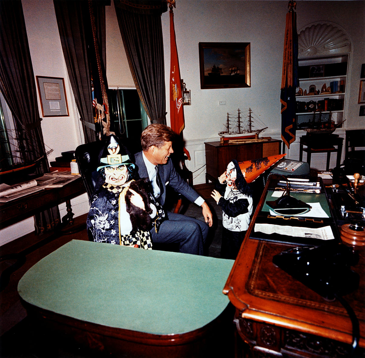 Thread #Halloween  , 1963: President Kennedy - with three weeks to live - has fun in the Oval with Caroline (L) and John Jr.