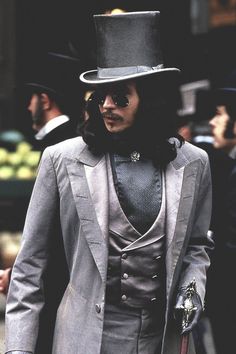 BUT WHO CARES?? Because this is also Completely Hot Contemporary Dracula time. Obviously his hair is inccurate, but the rest is nice. Grey morning coat, this time the right sinous lines, and yes, the sunglasses are entirely correct. Yum.