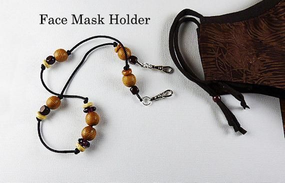 SantaFeKiss's tweet photo. Face Mask Holder w/Brown Wooden Beads. Handcrafted in the USA https://t.co/h2Rk4WD2Rb #faceholder #masklanyard #giftforher via @Etsy https://t.co/X01ZqvAB5X