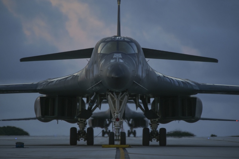 Two B-1B Lancer aircraft sit on a runway during a Bomber Task Force deployment at Andersen Air Force Base, Guam, Oct. 21, 2020. BTF missions provide opportunities to integrate plans and synchronize strategic activities and capabilities with other Combatant Commands to improve the U.S. military’s ability to become a more agile force. (U.S. Air Force photo by Staff Sgt. David Owsianka)